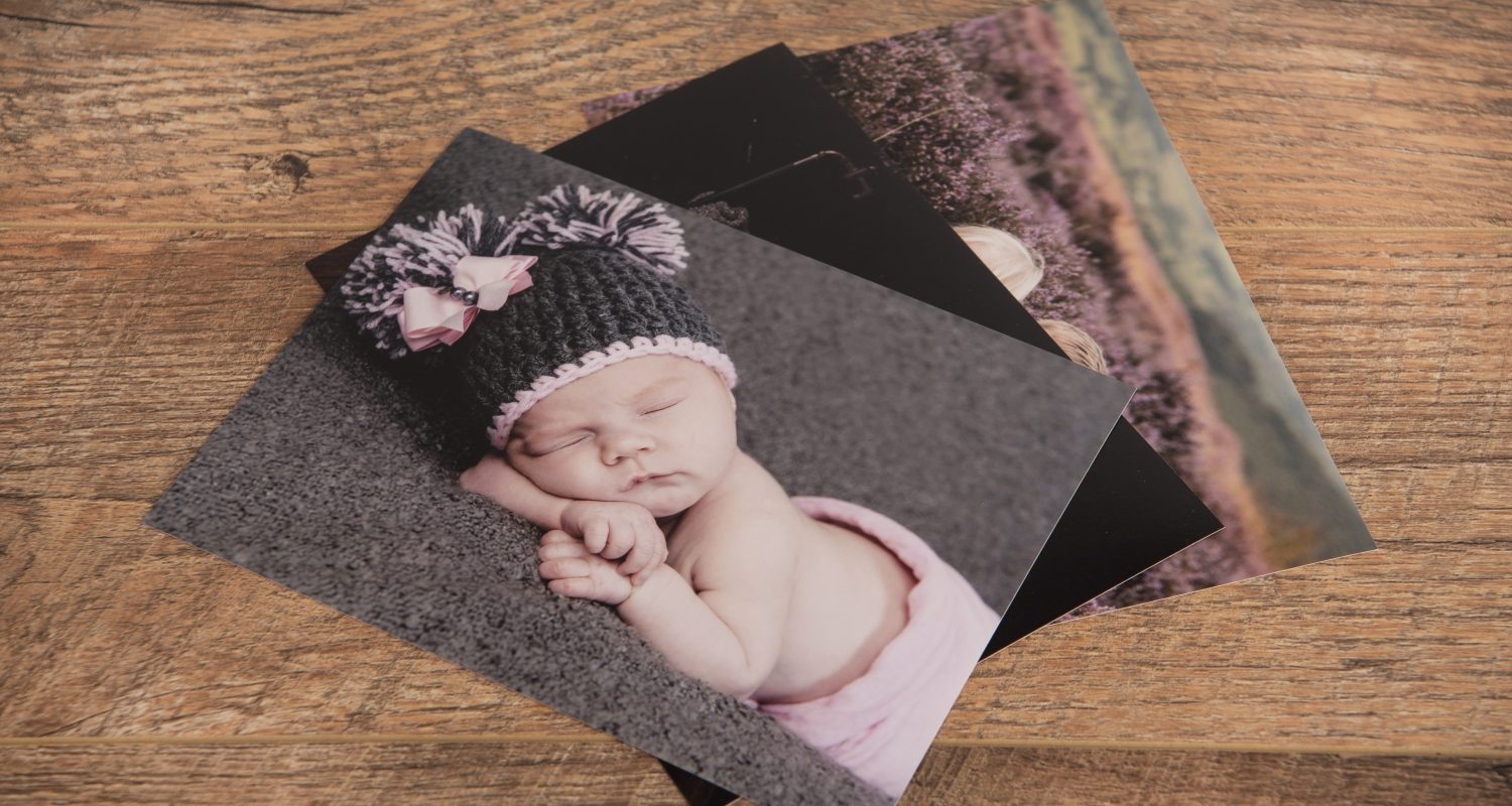 A photographic print of a newborn baby as an example of our photo print quality